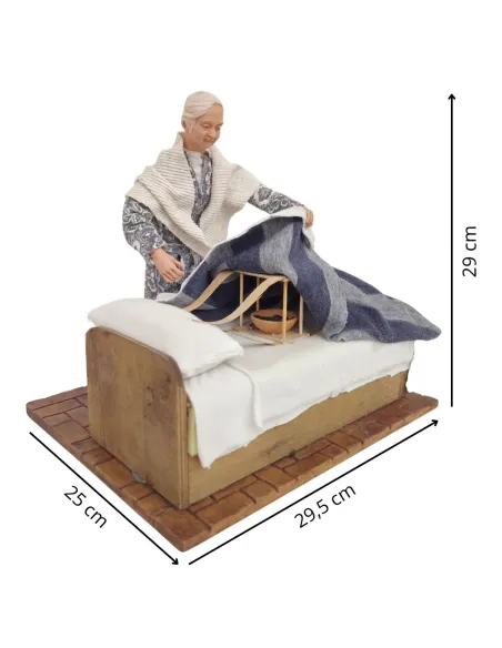 Animated Elderly Woman Warming a Heated Bed - 30 cm