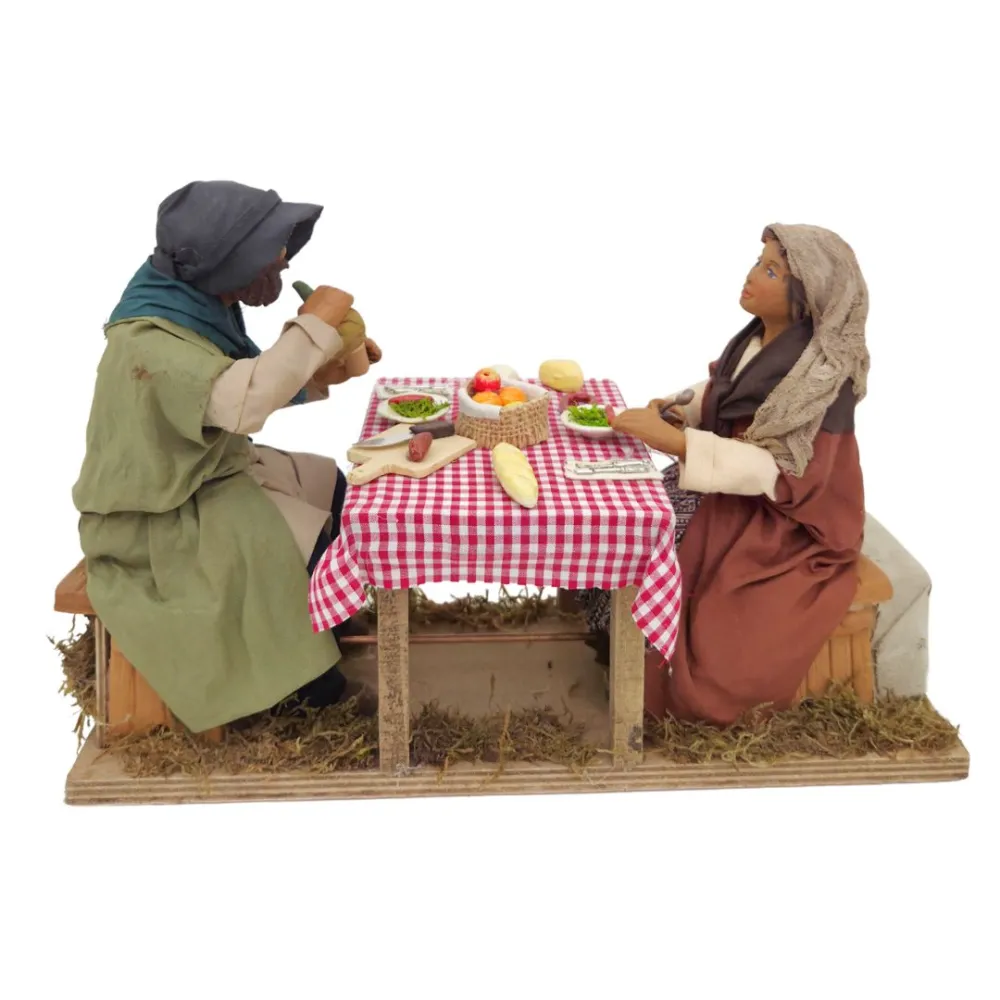 Tavolata con 2 personaggi in terracotta in movimento 25 cm